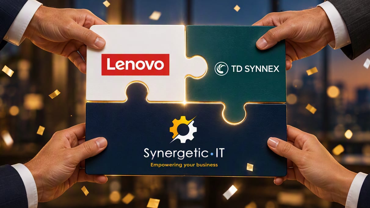 Four hands hold three connected puzzle pieces carrying the Lenovo, TD SYNNEX and Synergetic IT logos, with a warm golden glow along the seams and gold confetti in an office at dusk.